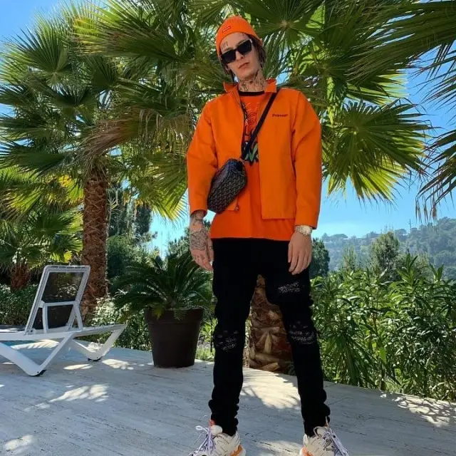 Kizaru outfit in Gucci, Louis Vuitton, and Supreme, 2019
