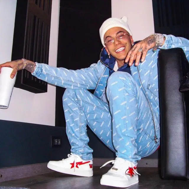Sfera Ebbasta outfit in Lacoste, Bape, and Cartier, 2020