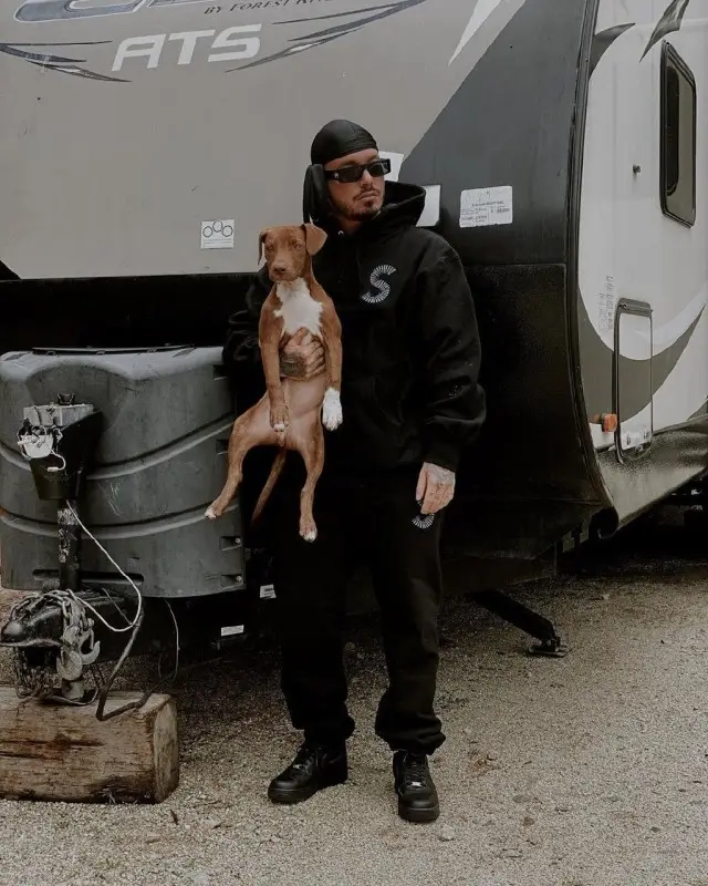 J Balvin outfit in Supreme, Louis Vuitton, and Nigo, 2020