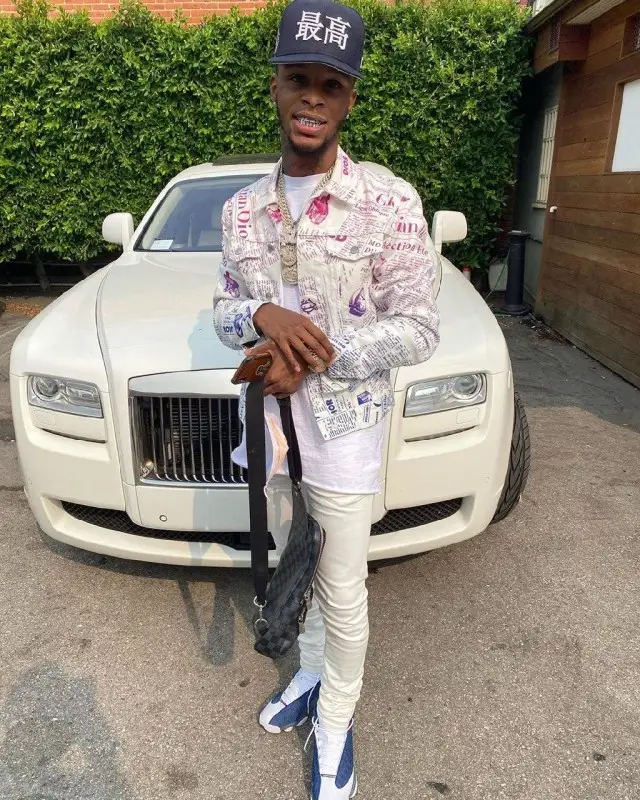 Toosii outfit in Dior, New Era, and Supreme, 2020