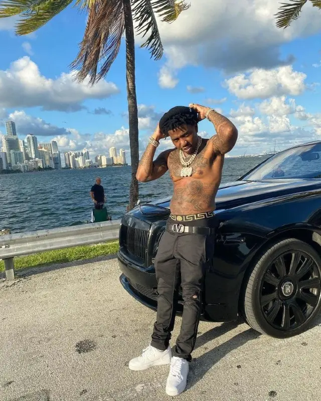 YFN Lucci outfit in Dickies, Valentino, and Versace, 2020