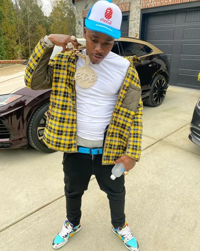 DaBaby outfit in Burberry, Bape, and Coca-Cola, 2020