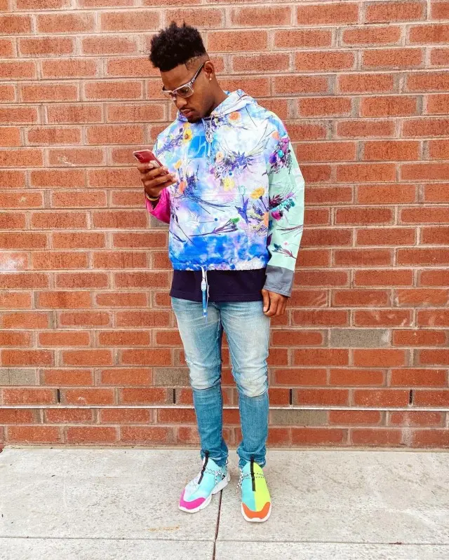 JuJu outfit in Louis Vuitton, John Elliott, and Oakley, 2020