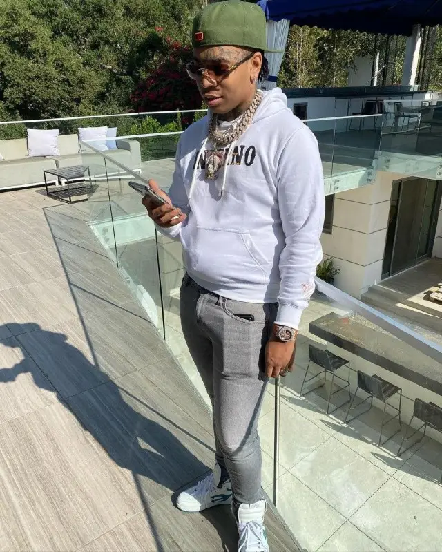 Lil Gotit outfit in Inferno, Amiri, and Cartier, 2020