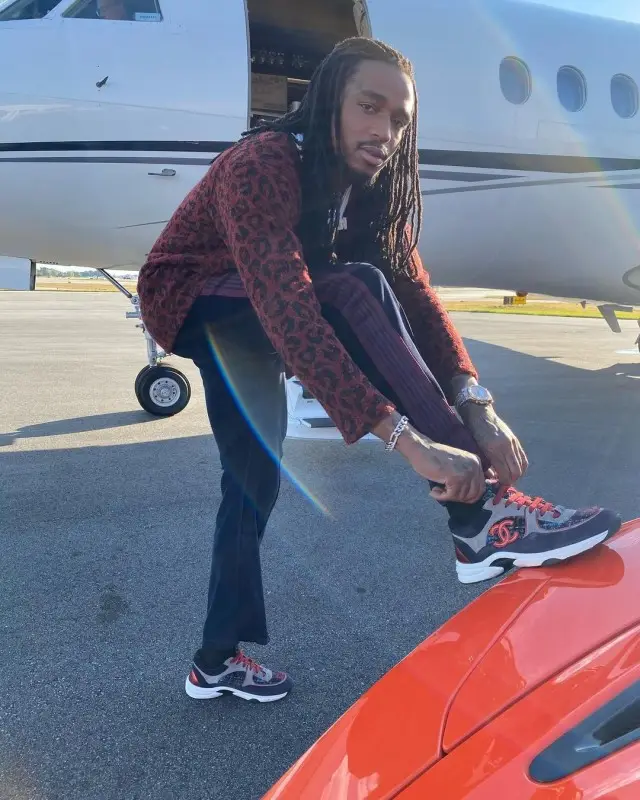 Quavo outfit in Saint Laurent, Needles, and Chanel, 2020