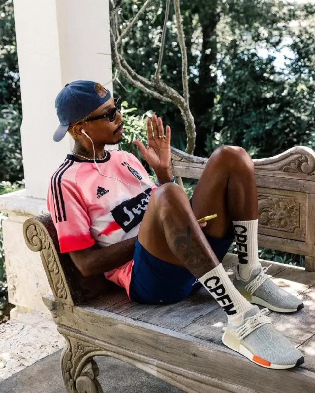 Pharrell Williams outfit in Adidas, Chanel, and Human Made, 2020
