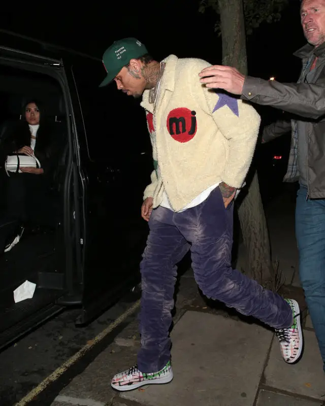 Chris Brown outfit in Marc Jacques Burton, Cactus Plant Flea Market, and Marc Jacobs, 2020