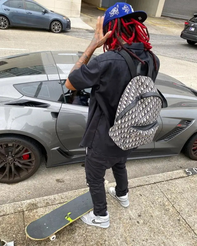 Lil Gnar outfit in Dickies, Nike, and Dior, 2020