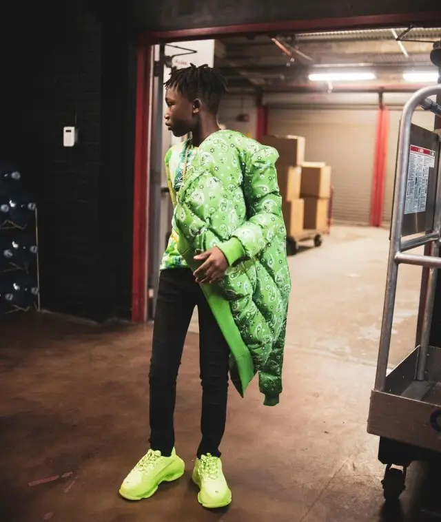 YNW BSlime outfit in SoleBoy, Versace, and Amiri, 2020