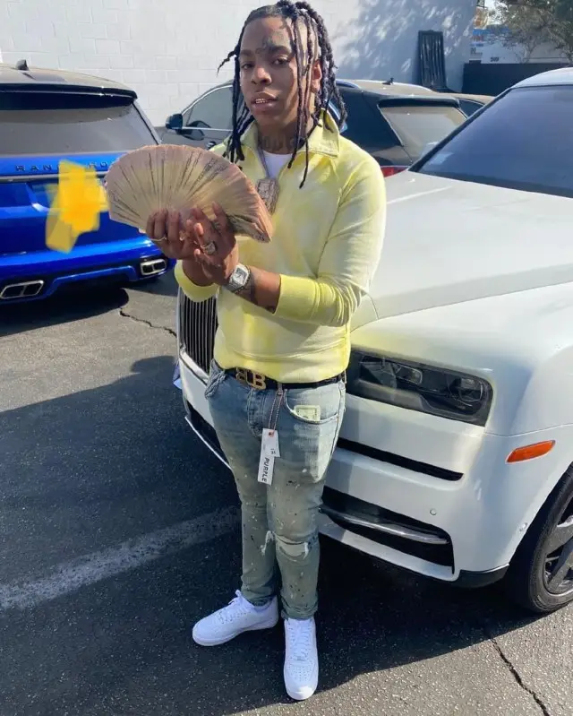 Lil Gotit outfit in Helmut Lang, Purple Brand, and Bally, 2020