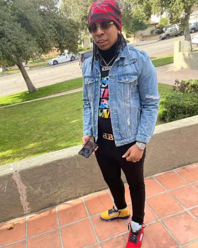 Lil Gotit outfit in Zara, Bally, and Cartier, 2020
