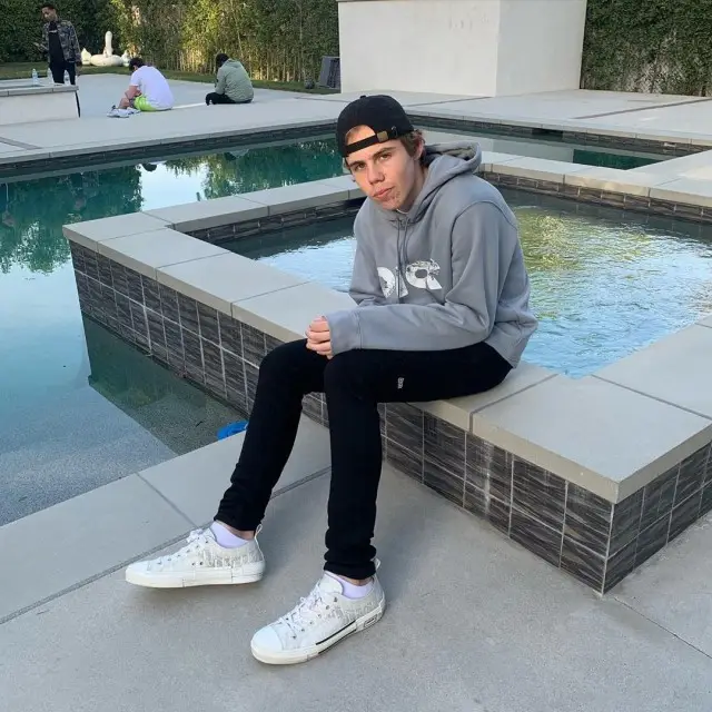 The Kid Laroi outfit in Dior, Daniel Arsham, and Ksubi, 2020