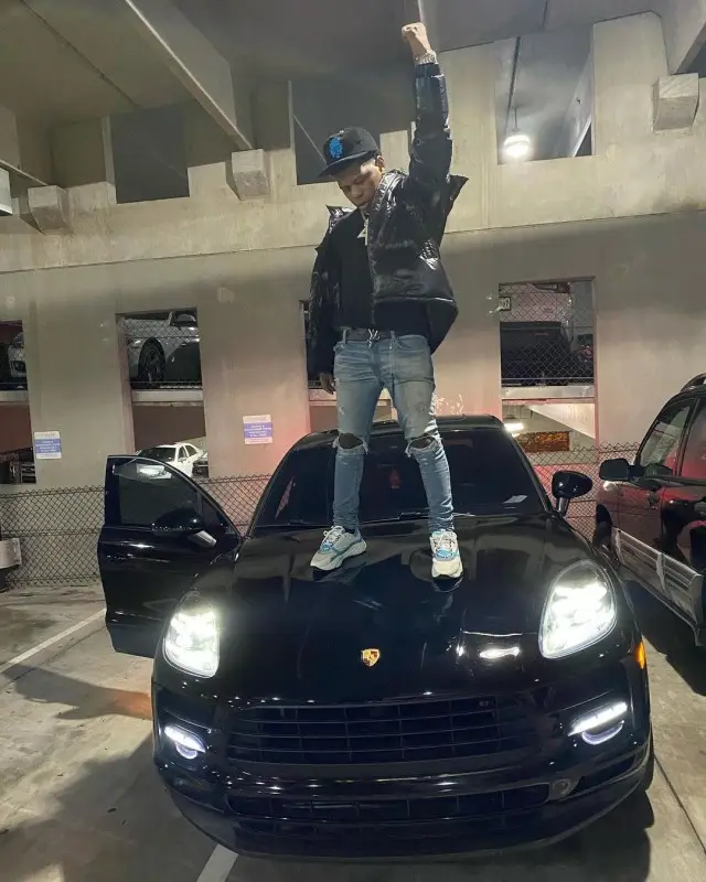 Rylo Rodriguez outfit in Moncler, Louis Vuitton, and Chrome Hearts, 2020