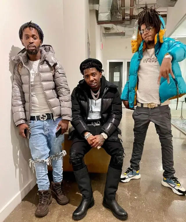 YFN Lucci outfit in Moncler, Dior, and Daniel Arsham, 2020