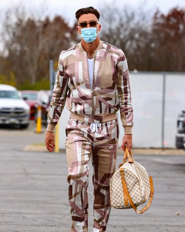 Travis Kelce outfit in Frere and Louis Vuitton, 2020