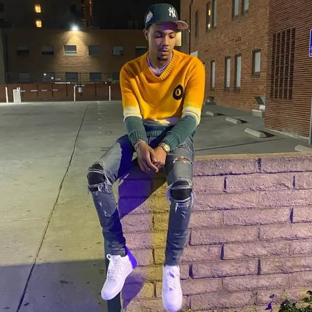 G Herbo outfit in The Elder Statesman, Amiri, and New Era, 2020