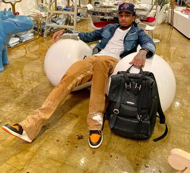 Quavo outfit in Juice Wrld Merch, New Era, and Offset Merch, 2020