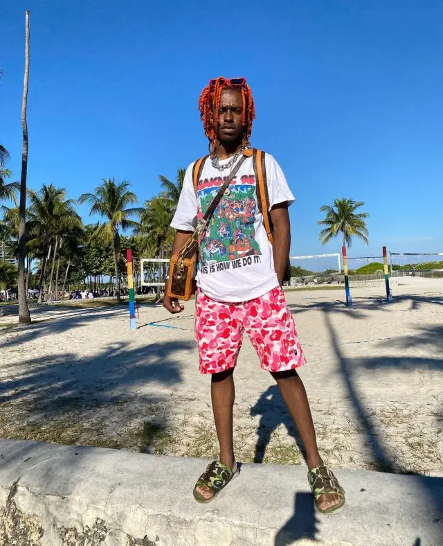 DP Kid outfit in Vintage, Bape, and Louis Vuitton, 2020