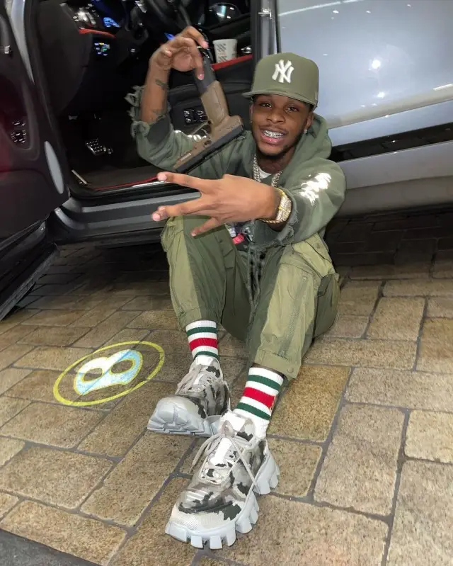 Toosii outfit in Prada, New Era, and Gucci, 2020