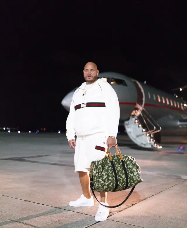 Fat Joe outfit in Gucci, Louis Vuitton, and Takashi Murakami, 2020