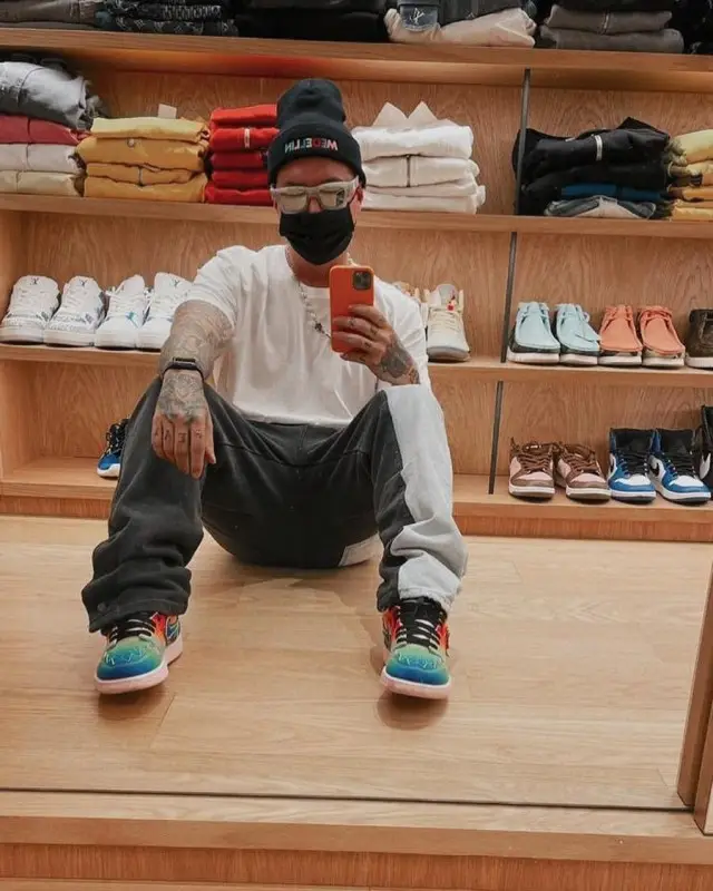 J Balvin outfit in Nike, Louis Vuitton, and J Balvin Merch, 2020