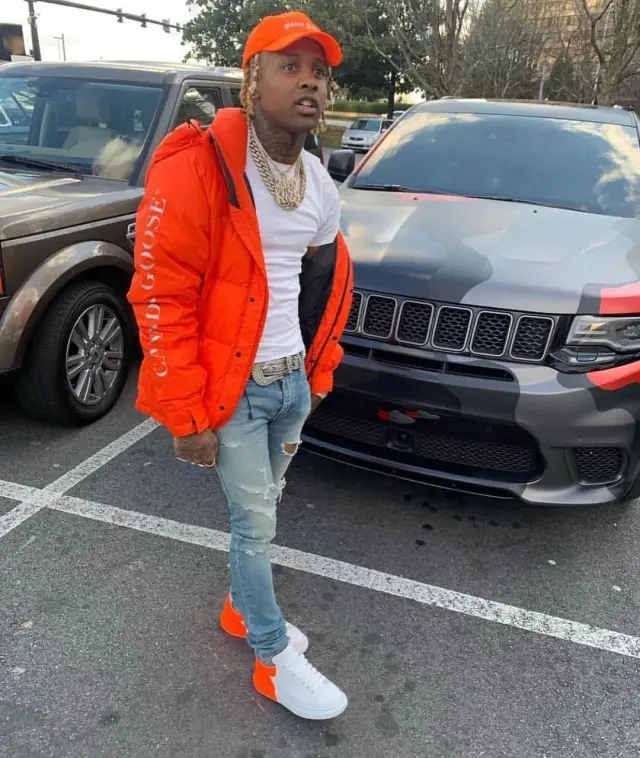 Lil Durk outfit in Canada Goose, B.B. Simon, and Palm Angels, 2020
