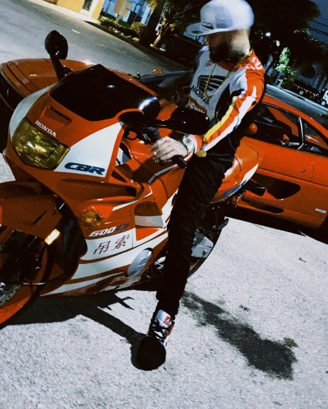 Farruko outfit in Supreme, Nike, and 100%, 2020