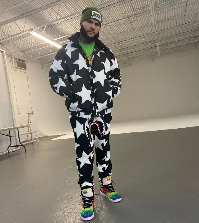 Farruko outfit in Bape, J Balvin Merch, and Supreme, 2020