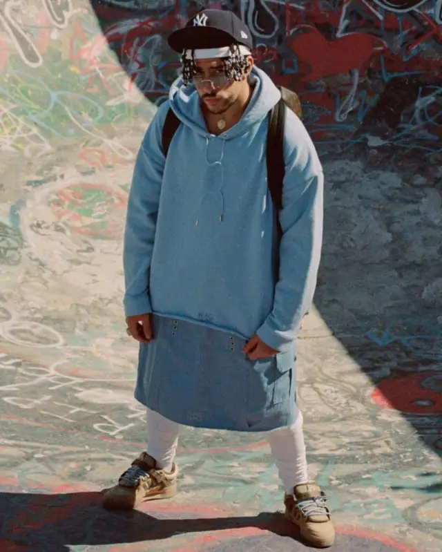 Bad Bunny outfit in Flag Lag, Louis Vuitton, and New Era, 2020