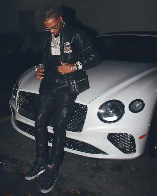 Lil Baby outfit in Avirex, Amiri, and Louis Vuitton, 2020