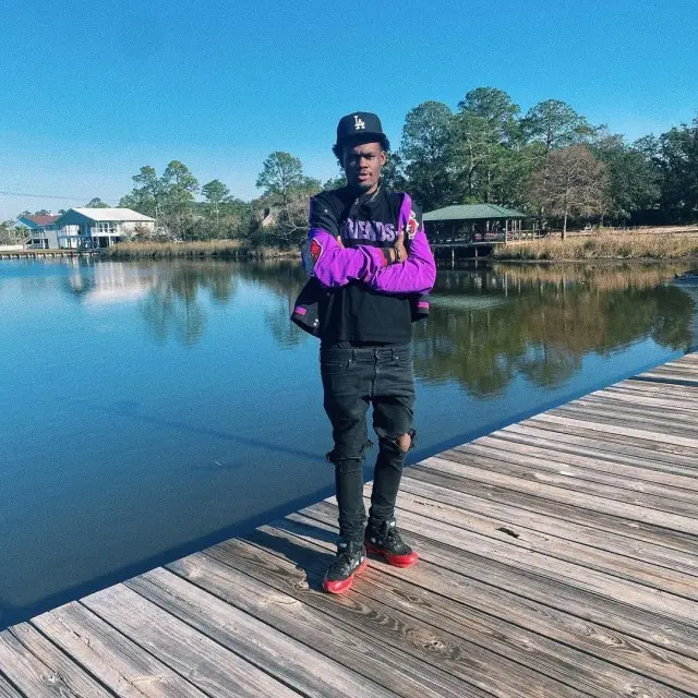Ugly God outfit in Mitchell & Ness, Vlone, and New Era, 2020