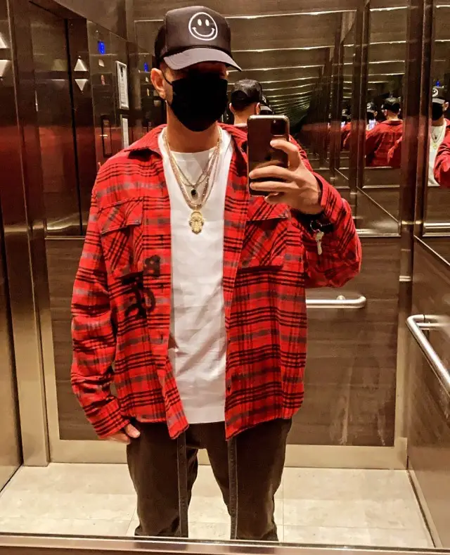Justin Quiles outfit in Off-White, Fear of God, and Urban Outfitters, 2020