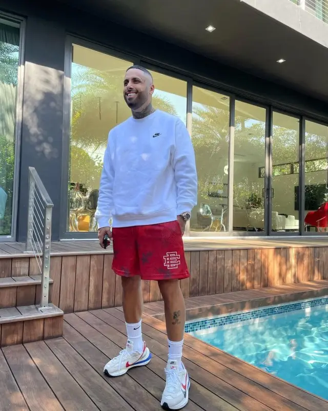 Nicky Jam outfit in Bape, Nike, and Eric Emanuel, 2020